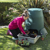 Image of Person gardening with a Green Johanna compost bin in a garden setting