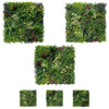 Image of Set of three artificial green wall panels on a white background