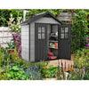 Image of Keter Oakland Garden Shed 754 With Tools In The Garden