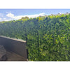 Image of Green Tropics Artificial Plant Wall Panel installed along the railing of a balcony or an outdoor terrace