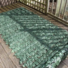 Image of Actual image showing the backing frame of the Artificial Ivy Leaf Hedge Screen laid flat on a wooden surface