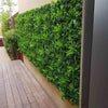 Image of Artificial Lavandula Vertical Garden Plant Wall Screening Panels installed on an exterior wall by a wooden deck