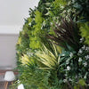 Image of Artificial Vertical Garden of Eden Installed Indoor Close Up View from a side angle with table and chair in the background