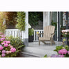 Image of silver sage adirondack chair on a porch with flowers and plants around