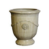 Image of Large sand ceramic french urn planter with decorative elements on a white background