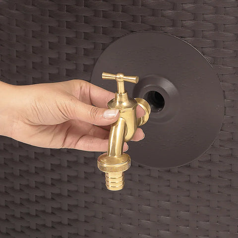 Hand holding a tap over the Sunda minitank water outlet