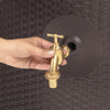 Image of Hand holding a tap over the Sunda minitank water outlet