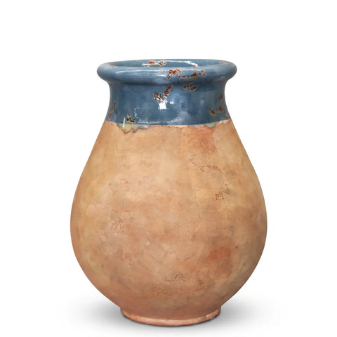 Blue Lagoon glazed French Biot jar with antiqued terracotta base on white background