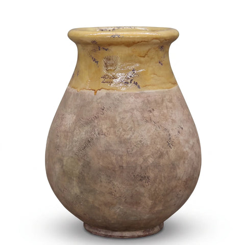 Aged Honey glazed French Biot jar with antiqued terracotta base on white background