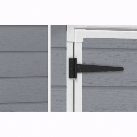Close-up of a gray wooden door with a black metal hinge on a white background