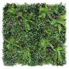 Artificial verdant fern green wall panel with various green plants on a white background