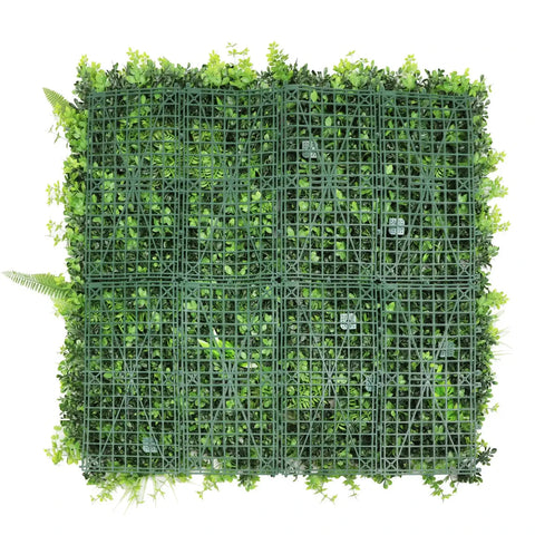 rear back side of square artificial green wall panel with grid structure on a white background
