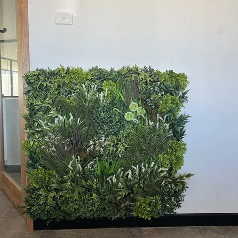 Artificial Vertical Garden of Eden One Panel Installed on a Wall below a light switch
