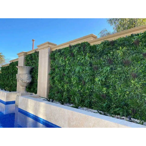 m x 1m UV Stabilised Coastal Greenery Artificial Vertical Garden Panel installed on a concrete wall alongside swimming pool