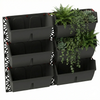Image of Wall-mounted gro wall slimline planters with plants on a white background