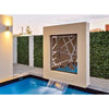 Image of Modern backyard pool with a waterfall cascading from a large beige wall surrounded by the Artificial Ivy Leaf Hedge 1m x 1m Plant Wall Screening Panel UV Protected